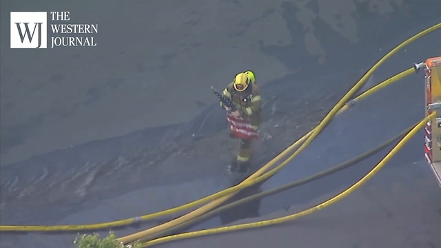 Firefighters Spot American Flag In Burning Building, Fight Through Flames To Save Old Glory