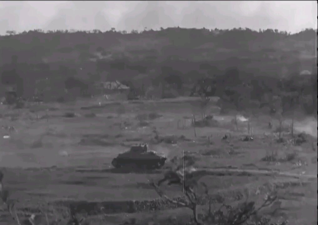 USMC Sherman under Japanese Anti Tank Fire on Okinawa (1945)