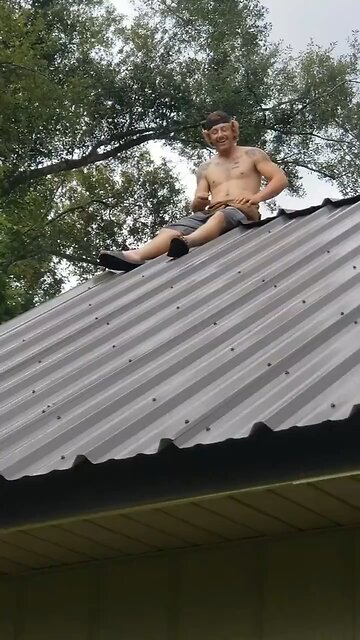 Guy Slides Off Roof and Hits His Butt