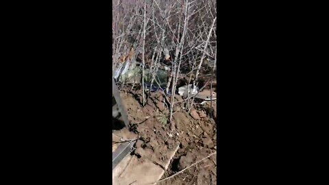 Ukrainian forces take position in a cemetery and mock the dead