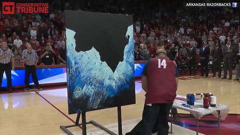 Man Paints Amazing Picture While SInging National Anthem
