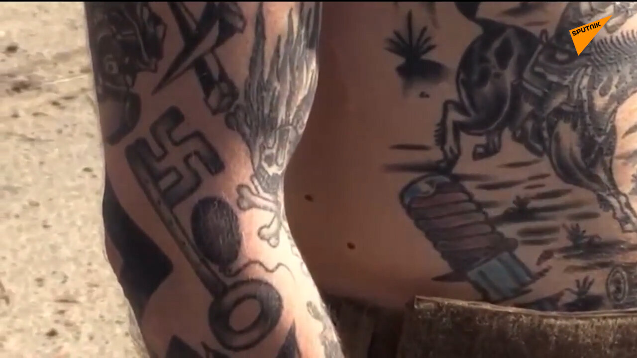 Kukasti krst i satanistički simboli na telima zarobljenih Azovaca