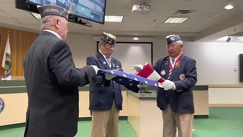 Ceremonial Flag Folding During Memorial Day Event At Clay County Commission