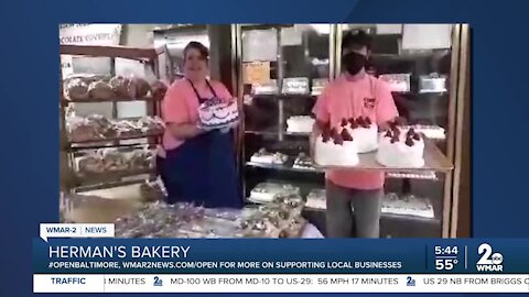 Herman's Bakery in Dundalk says "We're Open Baltimore!"