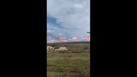 Russian reconnaissance and attack helicopter Ka-52 over Donbass