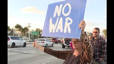 Dozens rally in Stuart to oppose any possible war with Iran