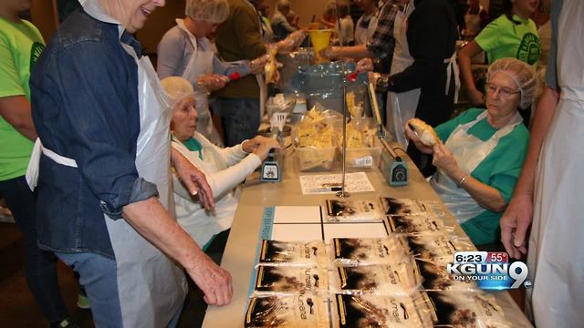 Church packages more than 30,000 meals for children in Haiti