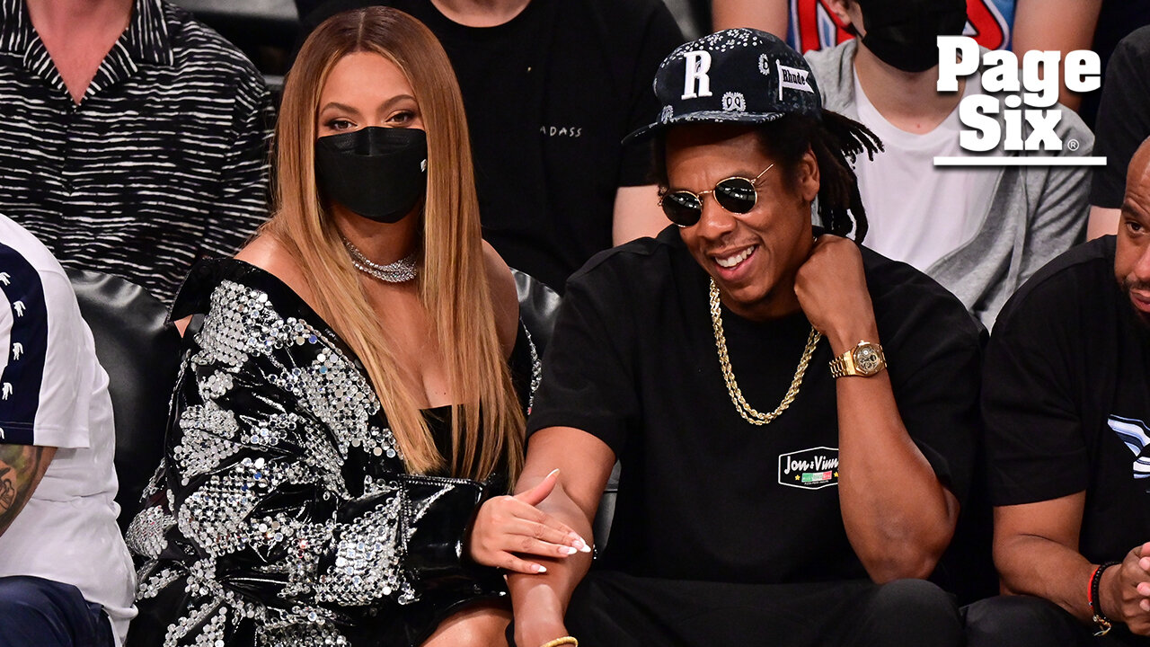 Beyonce and Jay-Z sizzle nets game