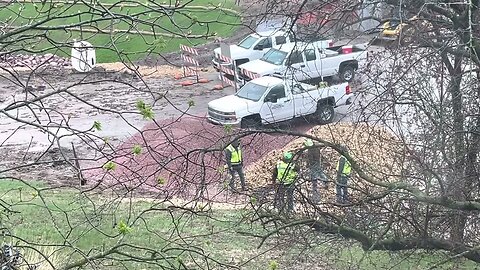 Construction Workers Making a Wood Chip Path in My Yard For Neighbors... Road Construction Project.