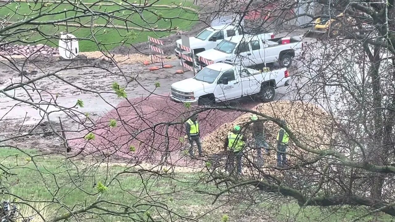 Construction Workers Making a Wood Chip Path in My Yard For Neighbors... Road Construction Project.