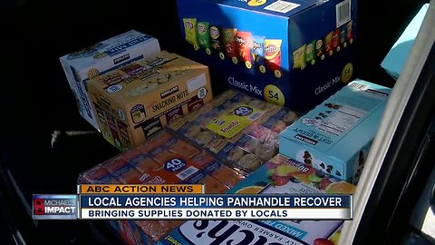 Locals help fill trucks to send to the Panhandle