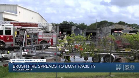 Brushfire spreads to boat building facility in Fort Pierce