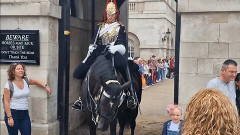 Another heart warming moment. kings guard moves his horse for a young girl with severe hair loss.