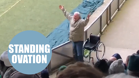 Video shows moment fan jumps out of his wheelchair to celebrate at football match