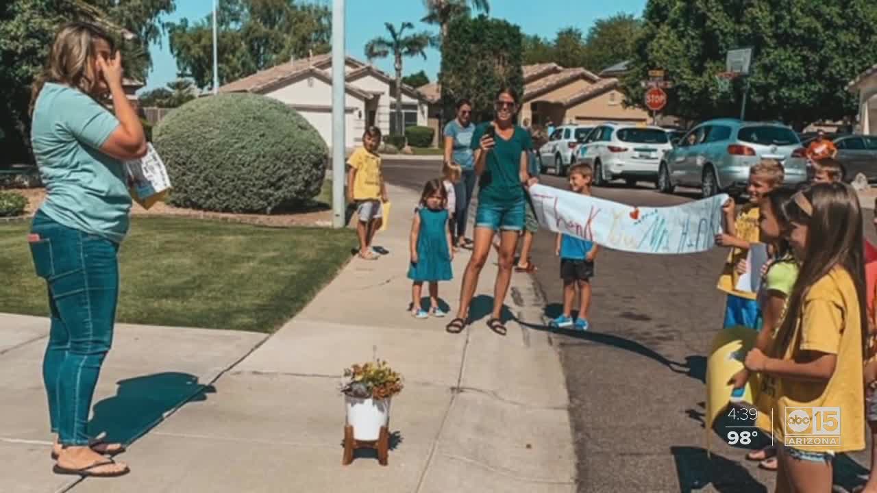 Students surprise teacher with parade