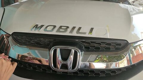 Tutorial pemasangan emblem mobilio di cup depan