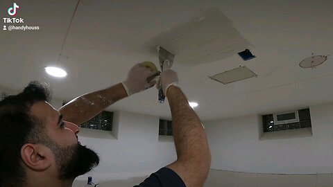 Handyman Finishes Drywall