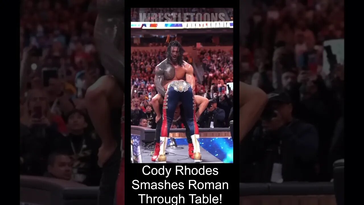 WWE Shorts. Cody Rhodes smashed Roman Reigns through announce table.