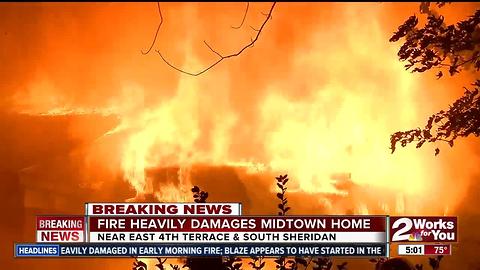 Home heavily damaged by fire near South Sheridan