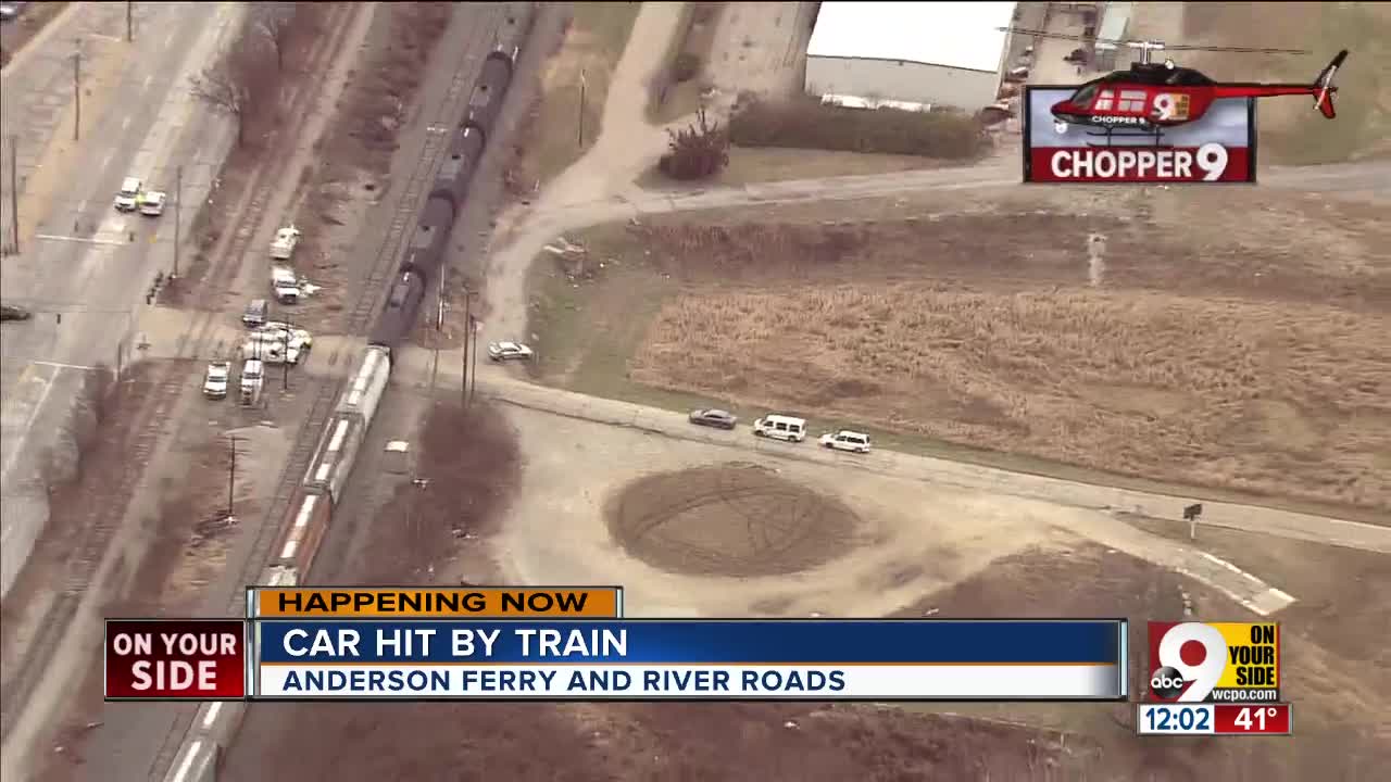 Car hit by train