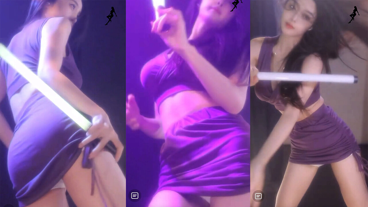 Sensual dance streamer showcases her curves in a purple, form-fitting skirt, highlighting her silhouette