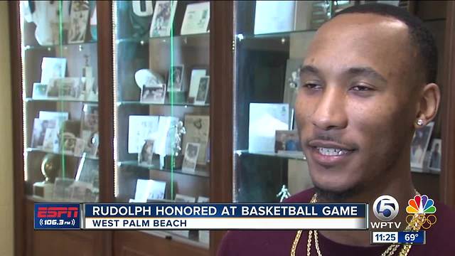 Rudolph Honored At Cardinal Newman