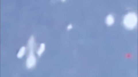 2 Sphere UFOs straddle head on with jet