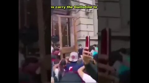 Guatemalans Carry Guillotine to Parliament