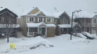 Tranquil flurries fill the driveways in Stittsville, ON