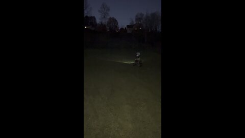 3 year old riding his xr50 with a headlamp