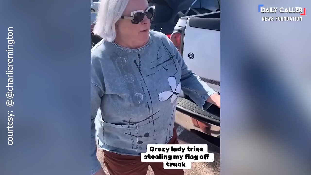 “Crazy Lady Tries To Take My Flag…Go Home You’re A Hundred Years Old….Crazy Democrats”