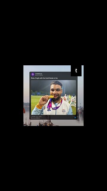 Rinku Singh holding his gold medal at the Asian Games.
