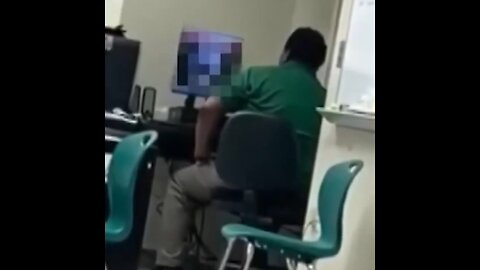 High School Football Coach Is Caught On Camera Watching Porn In Front Of Class