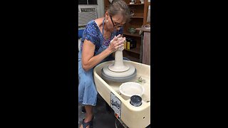 Centering porcelain clay.