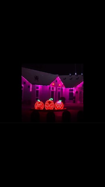 Halloween light display is set to electronic version of 'Grim Grinning Ghosts'