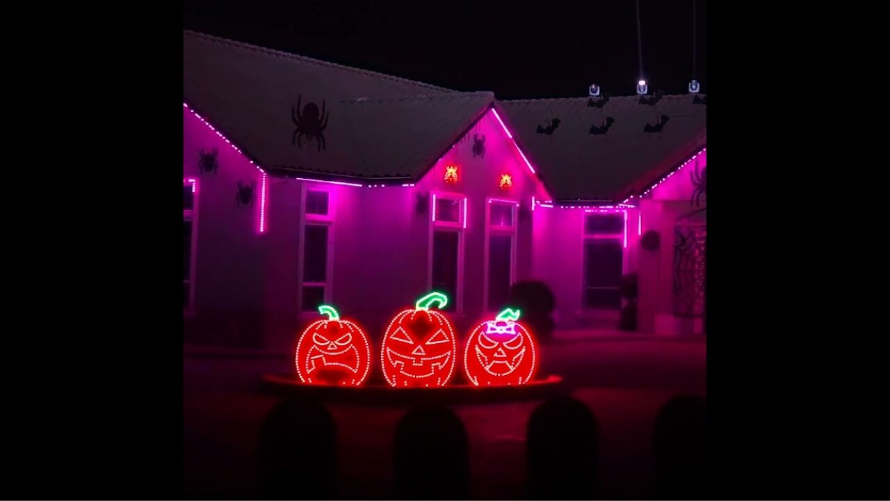 Halloween light display is set to electronic version of 'Grim Grinning Ghosts'