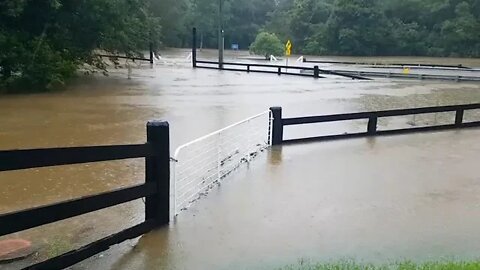 The rising flood waters. The fences were completely covered and the horses saved from this paddock
