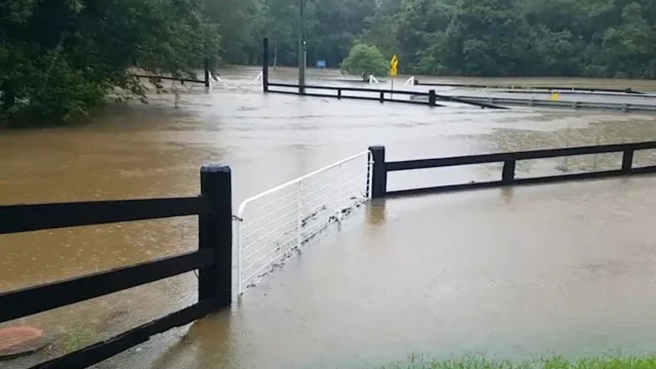The rising flood waters. The fences were completely covered and the horses saved from this paddock