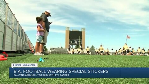 Broken Arrow football rallies around little girl with eye cancer