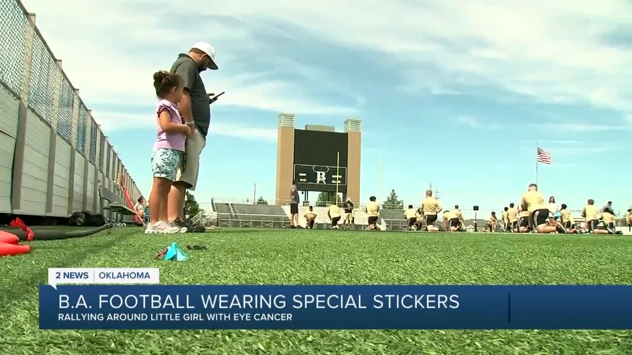 Broken Arrow football rallies around little girl with eye cancer