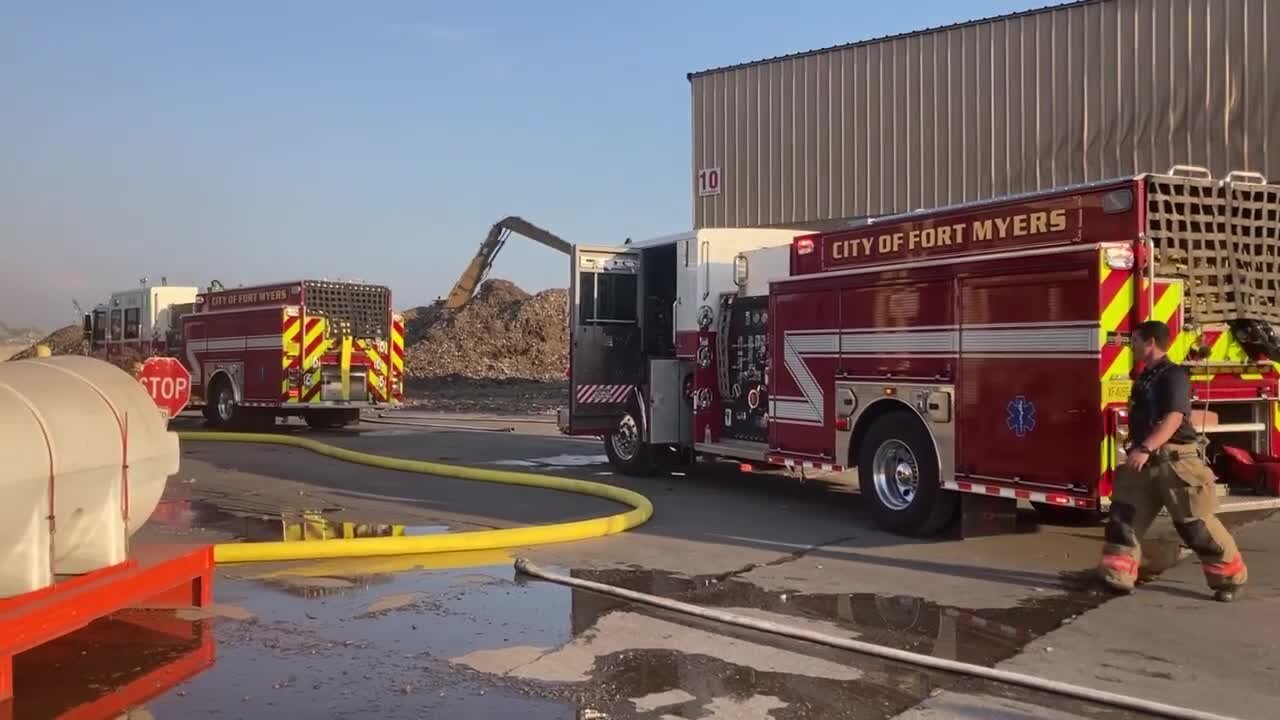 Fort Myers Fire Department work to extinguish fire at recycling plant