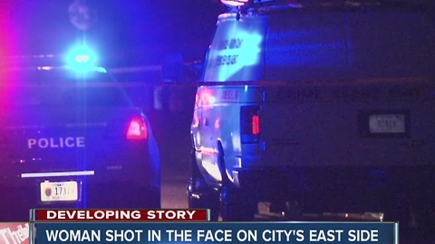 Woman in critical condition after being shot in the face while driving