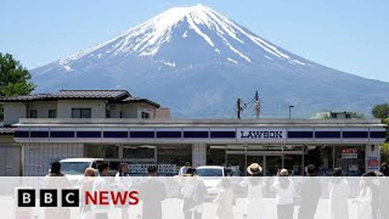 Japanese town blocks iconic Mount Fuji viewto deter tourists | BBC News