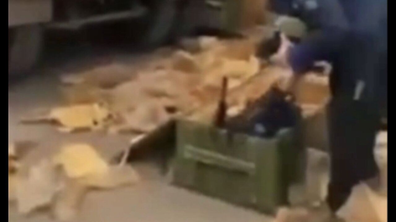 DISTRIBUTING WEAPONS TO UKRAINIAN CITIZENS IN KIEV