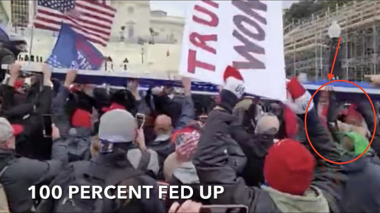 Watch Ray Epps Help Lift Massive Trump Sign Over Heads of Capitol Police