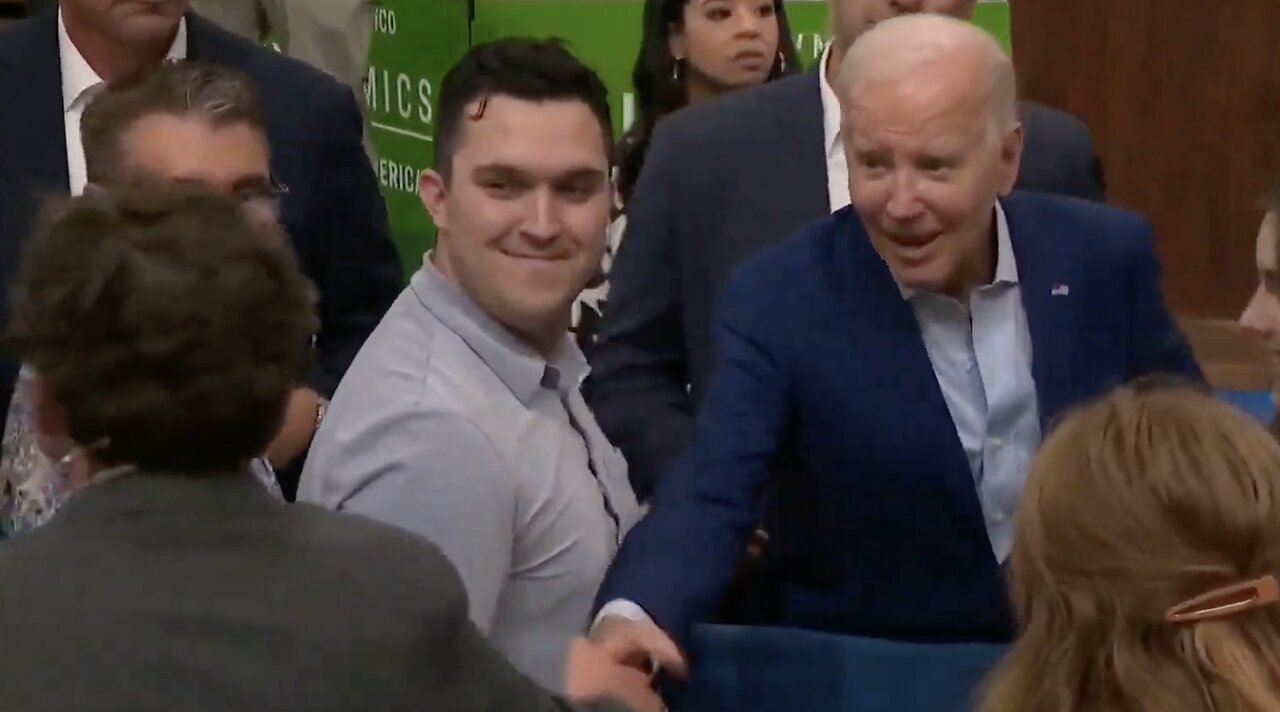 Is Biden Shaking Hands with a Secret Service Agent?