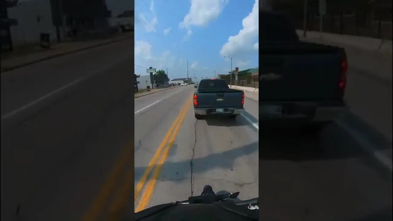 biker rear-ends a vehicle...