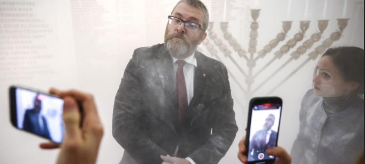 BREAKING: Polish MP Grzegorz Braun puts out Hanukkah candles with a fire extinguisher