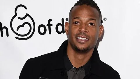 Marlon Wayans says he is being unfairly prosecuted after being by racially targeted by gate agent