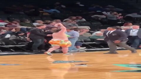 Topless pro abortion protesters run onto court at WNBA game in Brooklyn